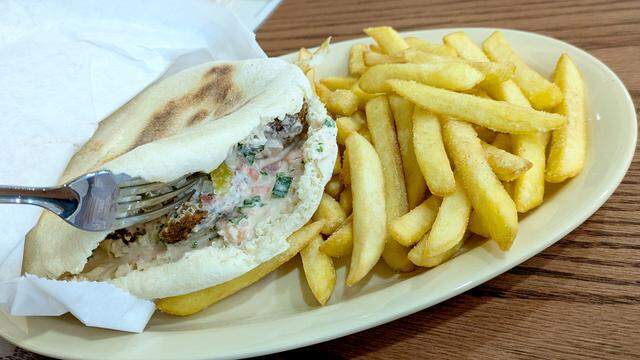 The falafel sandwich with fries at Royal Palm Mediterranean Cuisine